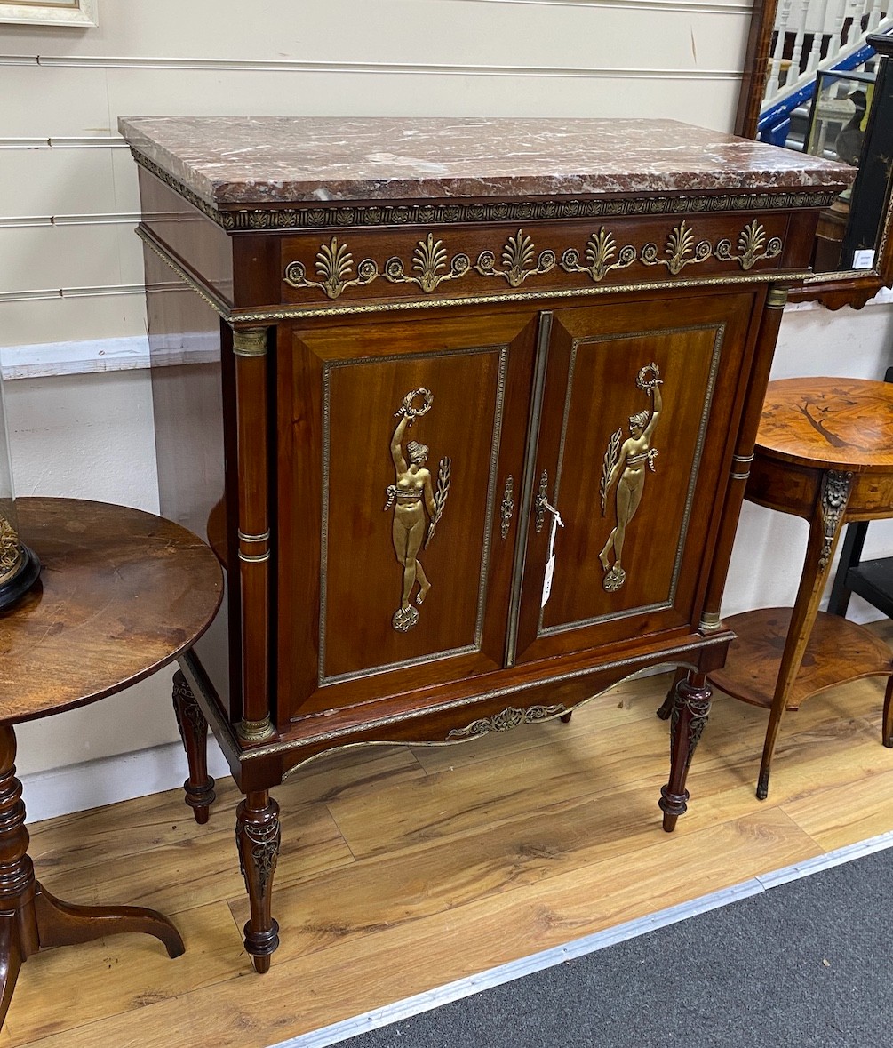 A French Empire style mahogany and gilt metal mounted marble topped side cabinet, width 89cm, depth 44cm, height 118cm